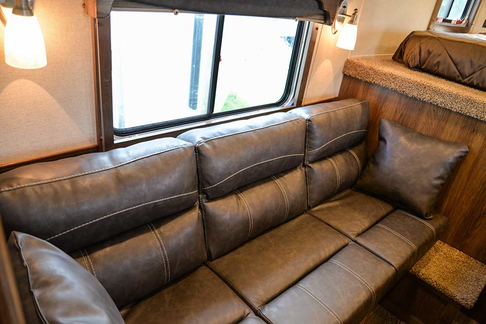 Sofa bed in a Laramie SLX8FK Horse Trailer | SMC Trailers