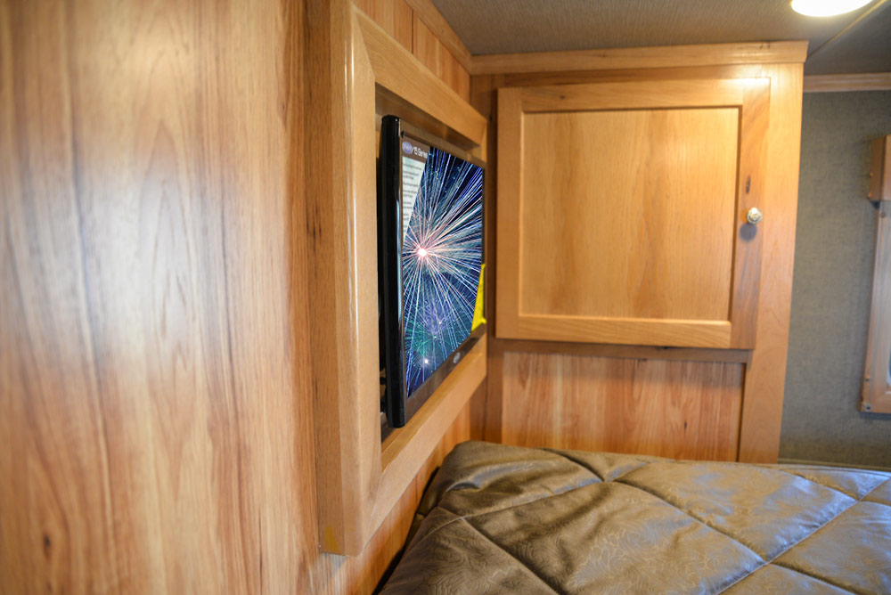 Bedroom TV in a SL8X16BB Laramie Horse Trailer | SMC Trailers